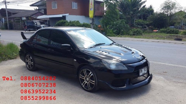 ขาย Mitsubishi New Lancer สีดำสวยมาก ชุดแต่งรอบคัน ราคา 195,000 บาท +++++