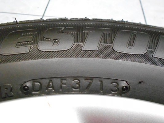 ขายกะทะป้ายแดง Nissan Almera ขอบ 14 พร้อมยาง Bridgestone 175/70/14 ปี 13/ใส่ฟรี ส่งฟรีค่ะ