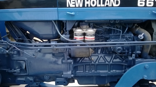 ต้องการขายรถไถ ฟอร์ด 6610 สองเพลาเสื้อลาย แบตใหม่ เครื่องดี เกียร์ดี ไฮดอร์ลิค์สมบูรณ์