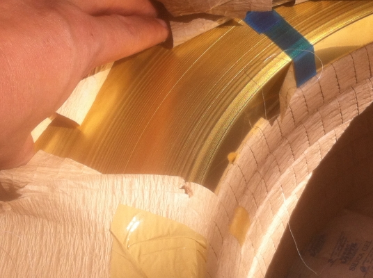 ทองเหลืองแผ่น ขนาดกว้าง 22หนา 0.4 มม.ยาวเป็นม้วนยาว น้ำหนักต่อม้วน 81 กิโลกรัม คิดกิโลกรัมละ 200 บาท