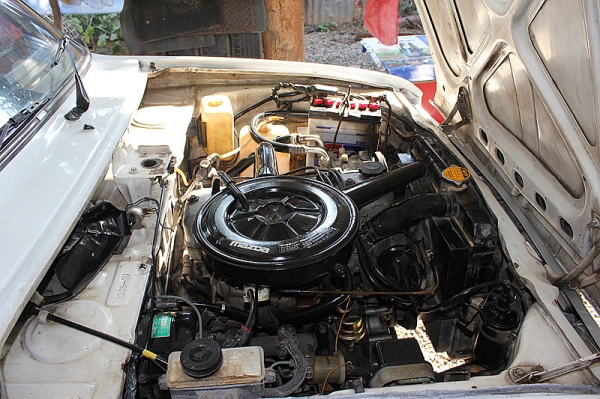 มาสด้าสีขาว  เครื่อง  1300    4  เกียร์ครับ