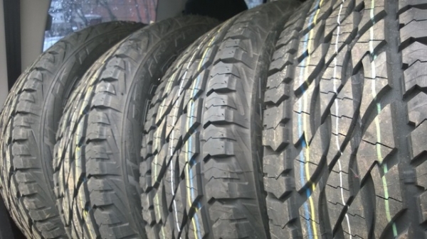 ยางใหม่  บริสโตน ดูลเลอร์  265 75 16  ปี 14