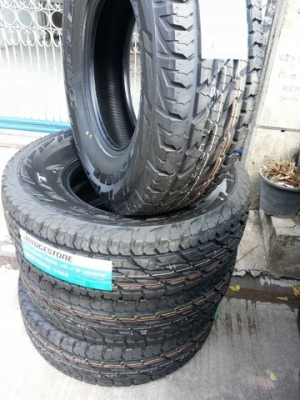 ยางใหม่  บริสโตน ดูลเลอร์  265 75 16  ปี 14