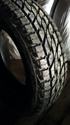 ยางใหม่  บริสโตน ดูลเลอร์  265 75 16  ปี 14