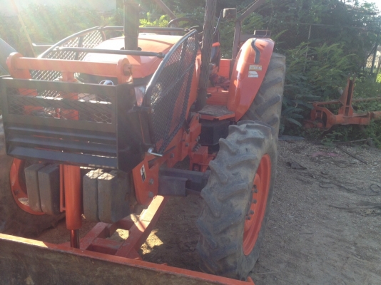 ขายรถไถ KUBOTA M7040 พร้อมอุปกรณ์ ดันหน้าและผานพรวน ขายรถไถ KUBOTA M7040 พร้อมอุปกรณ์ ดันหน้าและผานพรวน