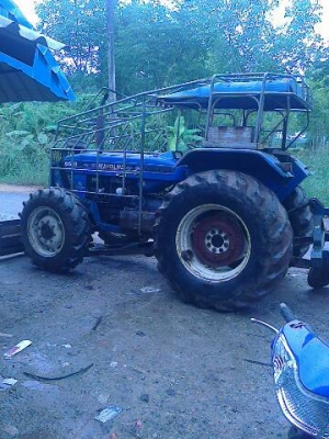 ขายรถไถ FORD 6610 2 เพลา ใบมีดดันหน้า 7 จ่าน เล่มทะเบียน ราคา 550000