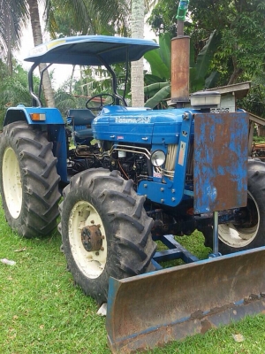 ขายรถไถ FORD 7610 2 เพลา เล่มทะเบียน ใบมีดดันหน้า 4 จาน ราคา 520000