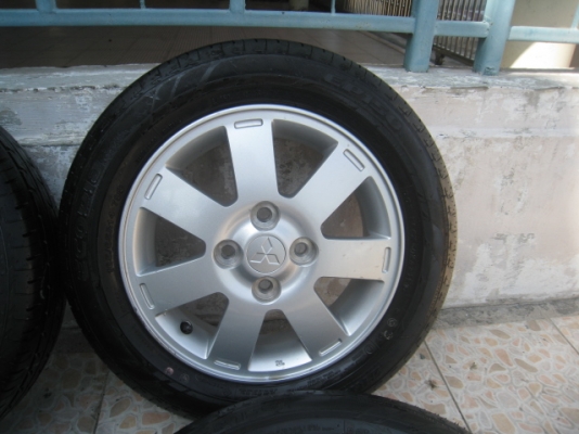 ขายล้อแม็กป้ายแดง Mitsu mirage 14"พร้อมยางปี13 สนใจติดต่อเล็กคลองสามครับ 081-3747940