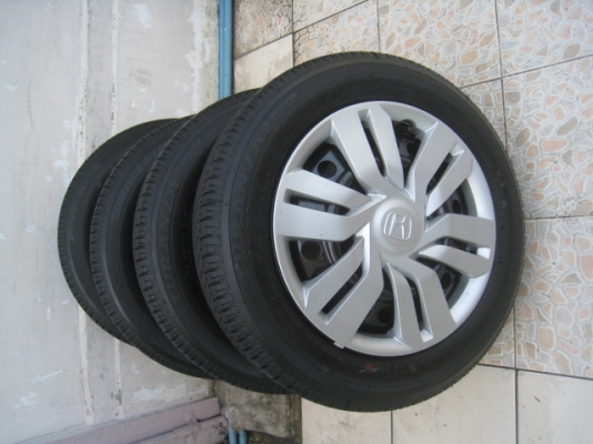 ขายกะทะล้อป้ายแดง Honda city ขอบ15  พร้อมยางปี14 สนใจติดต่อเล็กคลองสาม ครับ 081-3747940