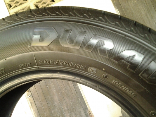 บริสโตน  205/70/15 กลางปี 12 ดอกหนาๆนุ่มๆ