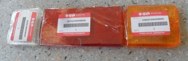 ฝาครอบไฟ  SUZUKI CARIBIAN แท้เบิกศูนย์