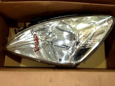 ---ขายแล้ว---ไฟหน้า NEW LANCER ของแท้ติดรถ 1 คู่