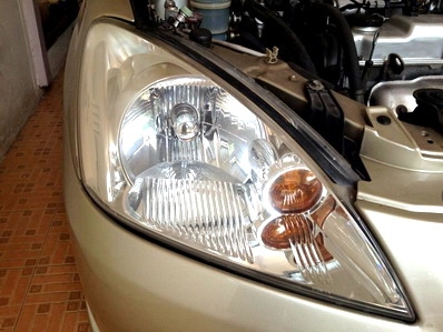 ---ขายแล้ว---ไฟหน้า NEW LANCER ของแท้ติดรถ 1 คู่