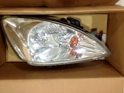 ---ขายแล้ว---ไฟหน้า NEW LANCER ของแท้ติดรถ 1 คู่