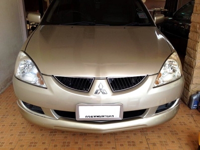 ---ขายแล้ว---ไฟหน้า NEW LANCER ของแท้ติดรถ 1 คู่