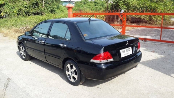 ขาย Mitsubishi New Lancer สีดำสวยมาก ตัว Top ราคา 185,000 บาท +++++ ขาย Mitsubishi New Lancer สีดำสวยมาก ตัว Top ราคา 185,000 บาท +++++
