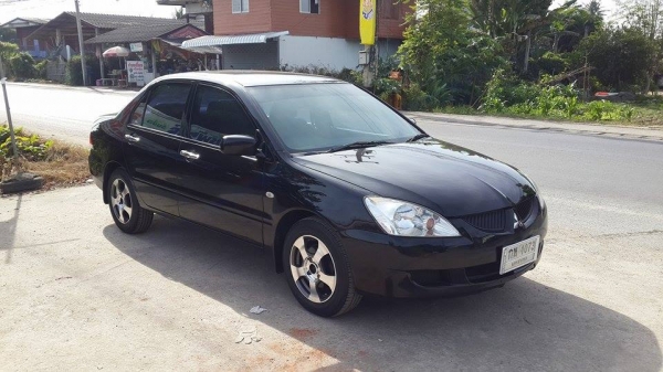 ขาย Mitsubishi New Lancer สีดำสวยมาก ตัว Top ราคา 185,000 บาท +++++