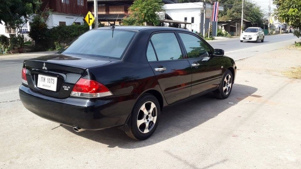 ขาย Mitsubishi New Lancer สีดำสวยมาก ตัว Top ราคา 185,000 บาท +++++ ขาย Mitsubishi New Lancer สีดำสวยมาก ตัว Top ราคา 185,000 บาท +++++