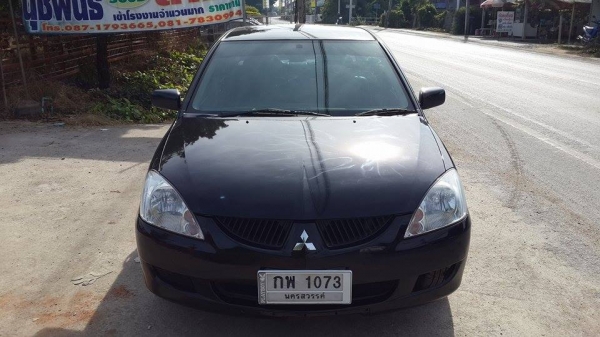 ขาย Mitsubishi New Lancer สีดำสวยมาก ตัว Top ราคา 185,000 บาท +++++ ขาย Mitsubishi New Lancer สีดำสวยมาก ตัว Top ราคา 185,000 บาท +++++