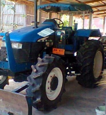 FORD TS90 NEW HOLLAND 2 เพลา รถสวยจัดครับ เครื่องแน่นดีแรงดีไม่มีเยิ้มครับ เกียร์ข้าง กรองเล็ก ช่วงล่างแน่น ยางสภาพดี 70\% พร้อมทำงานได้เลย เอกสารเล่มทะเบียนครบพร้อม ราคาต่อรองได้ครับ