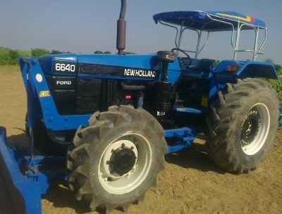 ขาย  รถไถFORD  รุ่น6640คานหน้าNEWHOLLAND  มีทะเบียนพร้อมใช้สนใจ0810076640