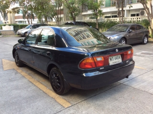 ขายรถมาสด้า 323 ซีดาน ปี 96 เครื่องเดิม 1.6 หัวฉีด เกียร์ธรรมดา ติดแก๊ส LPG  ภายในเดิมๆสวยมาก เบาะกำมะหยี่เดิมๆสะอาด เครื่องเสียง CD/จอทีวี LCD 7&quot; ซับเบส 10&quot; ใช้ได้หมด  กระจกไฟฟ้าทั้งคัน เพาเวอร์ แอร์เย็นฉ่ำ ตัวถังบางๆเดิมๆทั้งคัน สีสวยเงา รถสวย