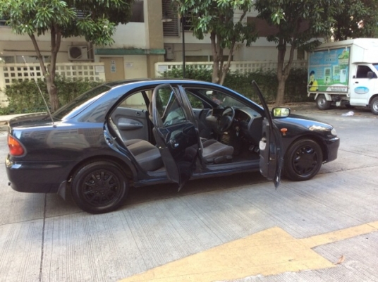 ขายรถมาสด้า 323 ซีดาน ปี 96 เครื่องเดิม 1.6 หัวฉีด เกียร์ธรรมดา ติดแก๊ส LPG  ภายในเดิมๆสวยมาก เบาะกำมะหยี่เดิมๆสะอาด เครื่องเสียง CD/จอทีวี LCD 7&quot; ซับเบส 10&quot; ใช้ได้หมด  กระจกไฟฟ้าทั้งคัน เพาเวอร์ แอร์เย็นฉ่ำ ตัวถังบางๆเดิมๆทั้งคัน สีสวยเงา รถสวย