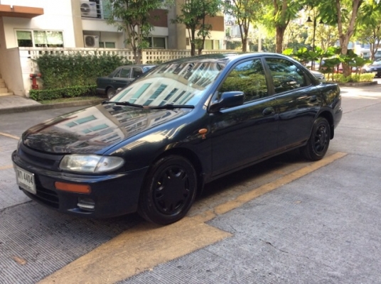 ขายรถมาสด้า 323 ซีดาน ปี 96 เครื่องเดิม 1.6 หัวฉีด เกียร์ธรรมดา ติดแก๊ส LPG  ภายในเดิมๆสวยมาก เบาะกำมะหยี่เดิมๆสะอาด เครื่องเสียง CD/จอทีวี LCD 7&quot; ซับเบส 10&quot; ใช้ได้หมด  กระจกไฟฟ้าทั้งคัน เพาเวอร์ แอร์เย็นฉ่ำ ตัวถังบางๆเดิมๆทั้งคัน สีสวยเงา รถสวย