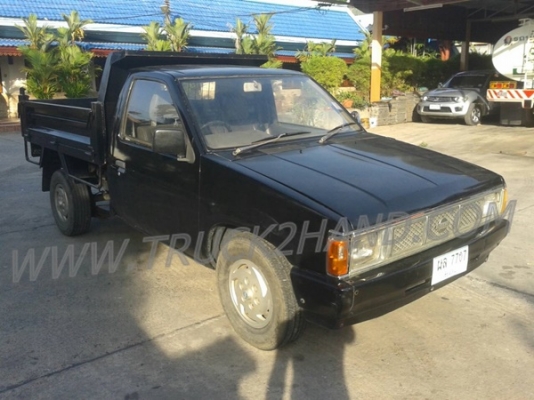 รถปิคอัพ 4 ล้อ กระบะดัมพ์  ยี่ห้อ NISSAN