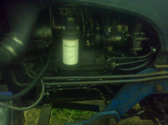 ขายรถไถฟอดร์   T S   90  นิวฮอนแลน ปี 04  ดํันหน้า kHL หาง 7 เล่มทะเบียน