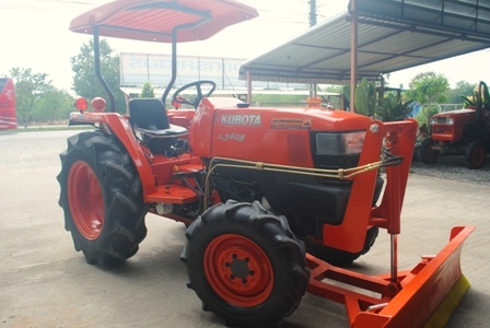 ขายรถไถ Kubota L 3408 (4WD) พร้อมมีดดันหน้าและผานพรวนช้าง สภาพพร้อมใช้งานครับ