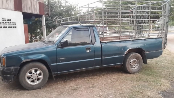 ขายรถกระบะมิตซู พร้อมคอกเหล็กบรรทุกวัว เครื่องดี แชชซีสวย เอกสารเล่มทะเบียนพร้อมโอน ทะเบียนเต็มปี58