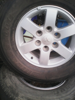 แม๊ก 6 รู  16X7J  MITSUBISHI ปาเจโร่ และ NAVARA  ยางBRIDGESTONE 265/70R16 ชุด 4 ล้อ TEL.081-427-3941