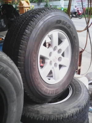 แม๊ก 6 รู  16X7J  MITSUBISHI ปาเจโร่ และ NAVARA  ยางBRIDGESTONE 265/70R16 ชุด 4 ล้อ TEL.081-427-3941