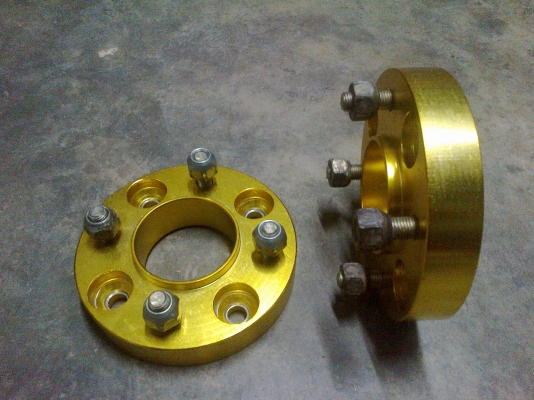 อแด๊ปเตอร์อะลูมิเนียม 4 รู 114.3 ออก 4 รู 114.3 หนา 1 นิ้ว