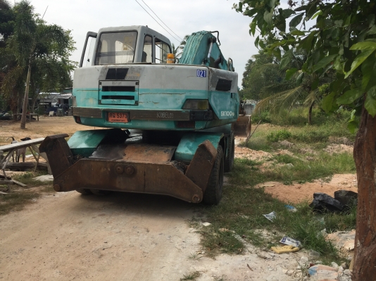 ขาย แบคโฮ ล้อยาง kobelco  SK100W ปี2549   06  เครื่อง 6D  น้ำหนัก 10600 ก.ก.  ตามสภาพครับ  ใช้งานได้อยู่ ภาษีไม่ขาด เล่มพร้อมโอน