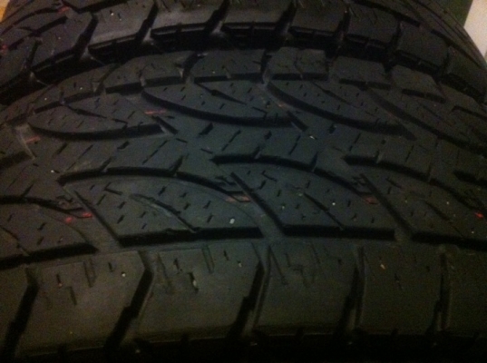 ยาง bridgestone 30 9.5 R15 สภาพดี