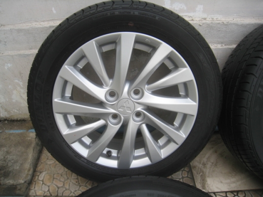 ขายล้อแม็กมือสอง Attrage 15" พร้อมยางปี13 สนใจติดต่อเล็กคลองสามครับ 081-3747940