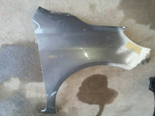 แก้มบังโคลนหน้าขวา NAVARA ของแท้มือสองงานเคาะซ่อม