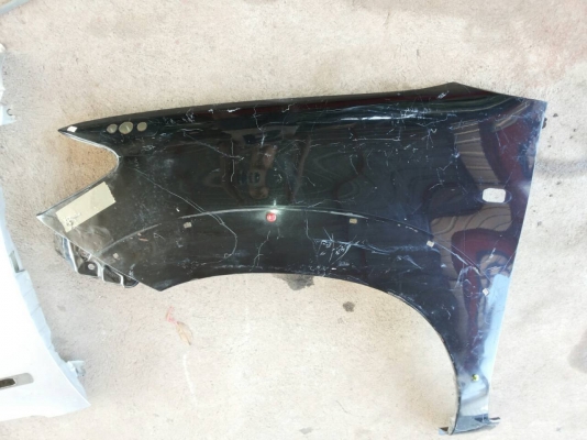 แก้มบังโคลนหน้าซ้าย วีโก้ ตัวก่อนแช้มป์ มีรูคิ้ว ของแท้มือสองงานเคาะซ่อม