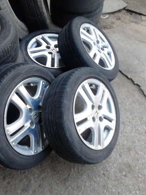 แม๊ก HONDA พร้อมยาง 185/55R15 BRIDGEATONE TURANZA TEL.081-427-3941 แม๊ก HONDA พร้อมยาง 185/55R15 BRIDGEATONE TURANZA TEL.081-427-3941