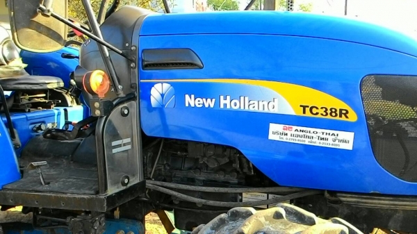 ขายรถไถ New Holland TC38R พร้อมใบดันหน้า ทะเบียนพร้อมโอน ขายรถไถ New Holland TC38R พร้อมใบดันหน้า ทะเบียนพร้อมโอน
