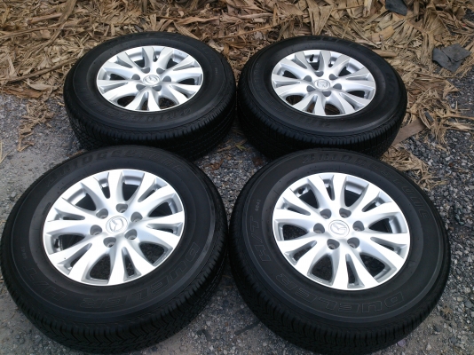 ขายแม็ก 6 รู ALL  NEW  MAZDA  พร้อมยางริดสโตน. 265/65R17 ยางสัปดาห์ที่23ปี13 ดอกยางเต็มสวยนิ่มลึกเท่ากันไม่ร้าวไม่แตกลายไม่กินข้าง(สภาพแม็กยาง95\%) จำนวน 1  ชุด