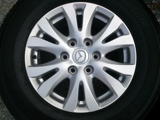ขายแม็ก 6 รู ALL  NEW  MAZDA  พร้อมยางริดสโตน. 265/65R17 ยางสัปดาห์ที่23ปี13 ดอกยางเต็มสวยนิ่มลึกเท่ากันไม่ร้าวไม่แตกลายไม่กินข้าง(สภาพแม็กยาง95\%) จำนวน 1  ชุด