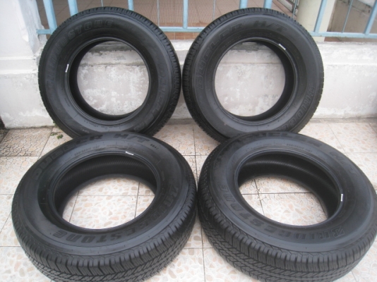ขายยางป้ายแดง Bridgestone dueler H/T 265/65r17 สนใจติดต่อเล็กคลองสามครับ 081-3747940