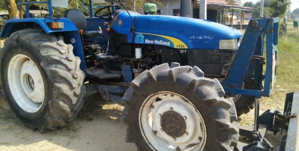 newholland    T55 พร้อมใช้  แถมดันหน้า+ผาน6x26"TT (((อยู่ไกลมีรถขนส่งบริการครับ))