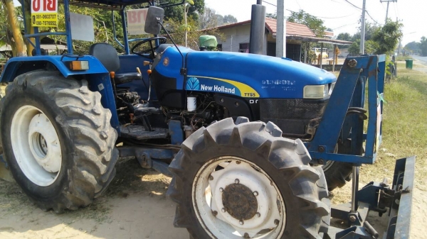 newholland    T55 พร้อมใช้  แถมดันหน้า+ผาน6x26"TT (((อยู่ไกลมีรถขนส่งบริการครับ))