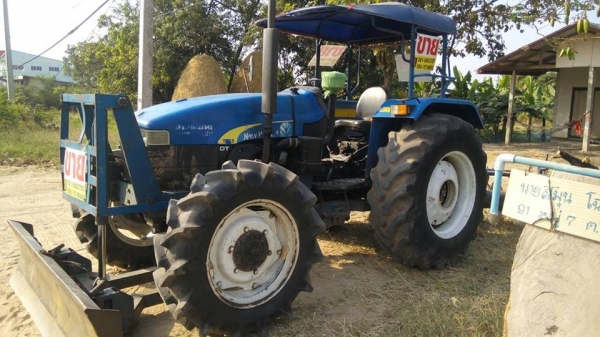 newholland    T55 พร้อมใช้  แถมดันหน้า+ผาน6x26"TT (((อยู่ไกลมีรถขนส่งบริการครับ))
