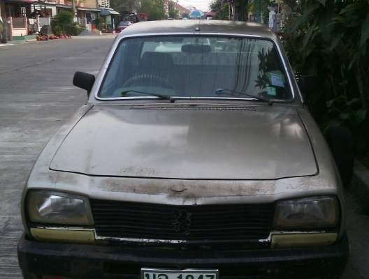 ขายเปอรโย504กระบะปี87 สีต้องทำ ขายตามสภาพ58,000 ขับได้ แอร์เย็น