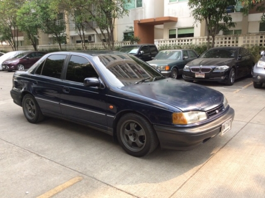 ขายรถฮุนได อีลันต้าปี92 เครื่อง 1.6 หัวฉีด 16valve เกียร์ออโต้ ติดแก๊ส LPG เพาเวอร์ ไฟฟ้า ภายในสวยเดิมเบาะสวยไม่มีขาด แอร์เย็นฉ่ำ พวงมาลัยnardy ตัวถังเดิมสีเงามีริ้วรอย แม็ก15&quot;น๊อตล้อซิ่ง เครื่องแน่นเกียร์เปลี่ยนนิ่มดี ค้ำโช๊คcusco รถขับดีครับ พร้อมใ